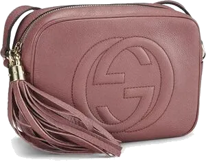 Dusty pink Gucci Soho Disco camera bag with a leather tassel pull