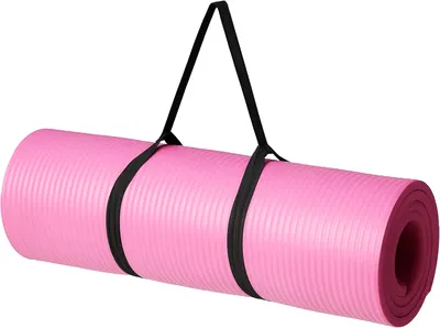 Rolled pink exercise mat with a black carry strap