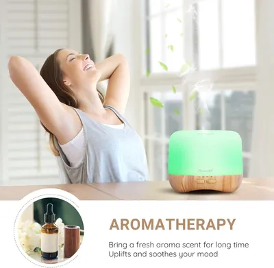 Woman stretching beside a wood-effect aromatherapy diffuser lit green