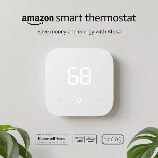 Amazon Smart Thermostat mounted on a wall showing 68 degrees