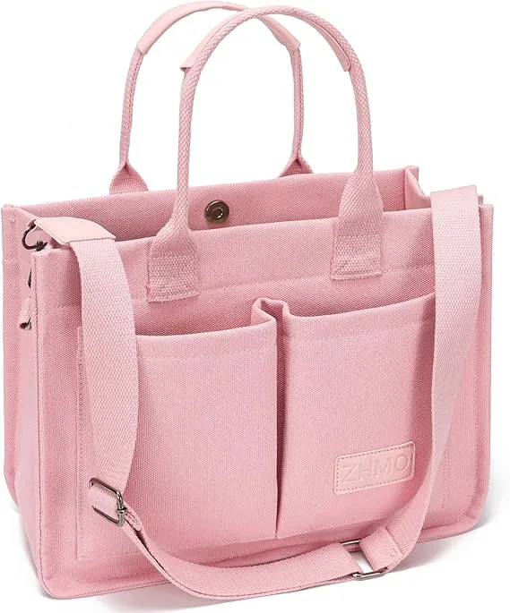 Pink structured tote bag with front pockets and a shoulder strap